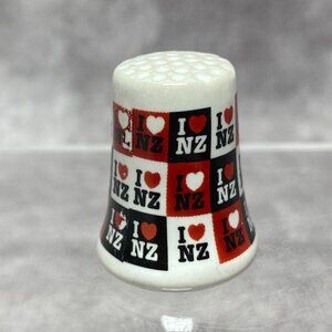 Ceramic "I Love NZ" Souvenir Thimble With Black & Red Checkered Design